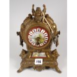 A French spelter & porcelain antique mantel clock