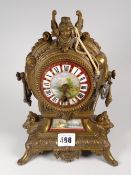 A French spelter & porcelain antique mantel clock