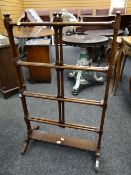 A delicate antique mahogany folding-out towel-airer