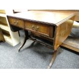 An antique-reproduction drop-flap cross-banded sofa-table (distressed)