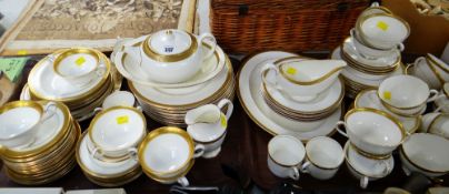 A large quantity of various gilt & white tea and dinnerware including Wedgwood 'Senatur', Royal