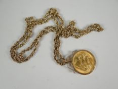 A 1966 gold full sovereign on a 9ct chain, 24grams total