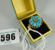 A 15ct gold turquoise floral ring with centre stone