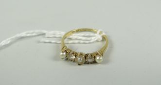 An 18ct gold seed pearl & diamond ring