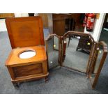 An antique mahogany box seat commode with glazed pottery insert & a tri-fold toilet mirror