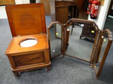 An antique mahogany box seat commode with glazed pottery insert & a tri-fold toilet mirror