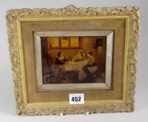 A small framed antique crystoleum of three figures around a table