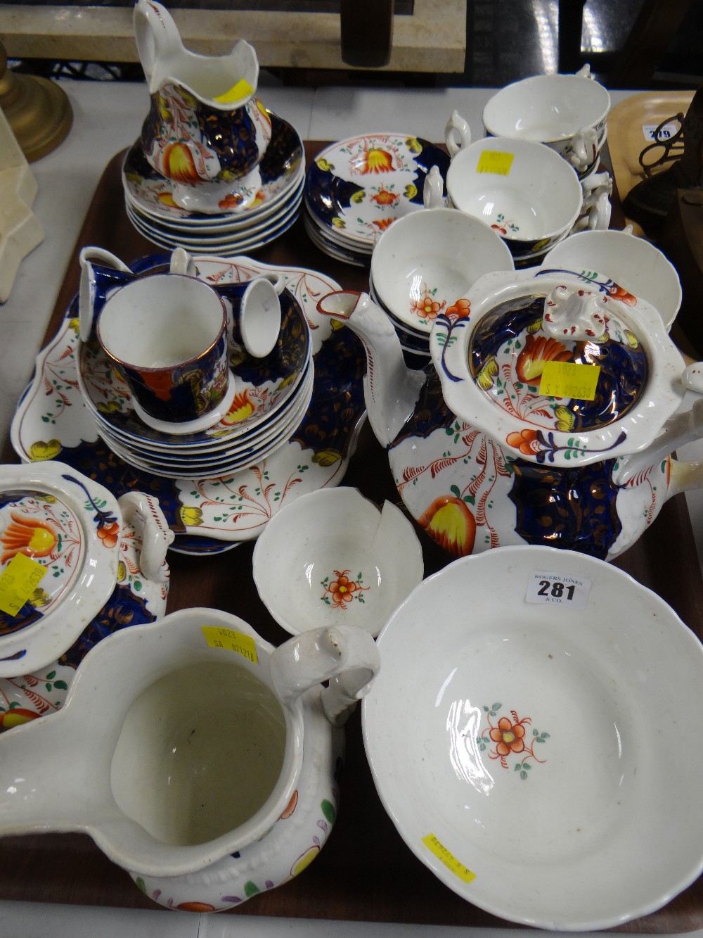 A good quantity of Gaudy Welsh Tulip patterned teaware including teapot, cream jug, saucers & plates