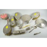 A parcel of silver-backed dressing-table items, a silver-based pin-cushion etc