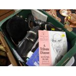 A parcel of sporting collectables including old football boots, riding hat, programmes &