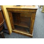 An antique inlaid walnut single-door pier cabinet with metallic decoration (distressed), 85cms wide