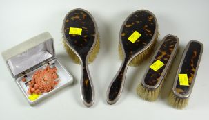 Four silver & tortoiseshell brushes together with a boxed pink coral pendant & earrings