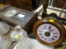 A wall clock (distressed) & a circular vintage wall clock