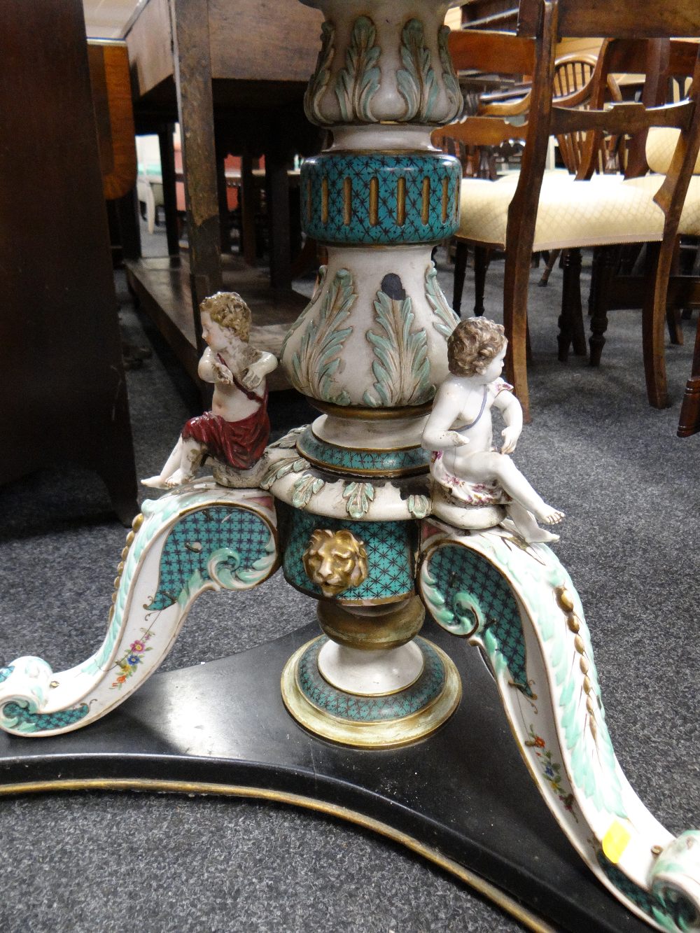 An unusual antique table having an Italianate porcelain & wooden painted cherubic tri-form base - Image 3 of 5