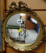 A vintage gilt circular mirror