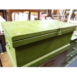A vintage green painted pine blanket chest with contents