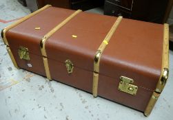 A modern wooden banded steamer trunk with brass fittings