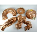 Five copper jelly moulds etc