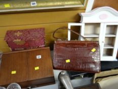 A ladies vintage crocodile handbag, a miniature Welsh dresser, briefcase etc