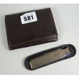 A vintage leather Dunhill wallet / purse together with a silver fold-out Dunhill machine-turned