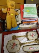 A parcel of mixed items including old teddy bear, local history books, a leather collar box with