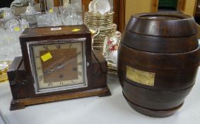 A pre-war polished mantel clock & a wooden sectioned barrel