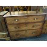 An antique chest of three drawers on bun feet, 108cms wide