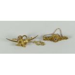 Two gold bar-brooches including swallow & heart example