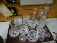 A quantity of cut glass items including sundae dishes & decanters