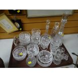 A quantity of cut glass items including sundae dishes & decanters