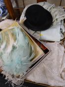 Parcel of vintage clothing, wedding dress, dressing up feathers, bowler hat etc