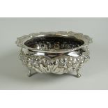 An antique repousse silver footed dish, Sheffield 1892, 5.2oz