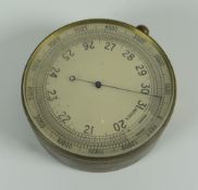 A pocket aneroid barometer by T Wheeler