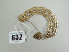 A 9ct yellow gold gate bracelet with heart shaped padlock, 10grms