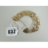 A 9ct yellow gold gate bracelet with heart shaped padlock, 10grms
