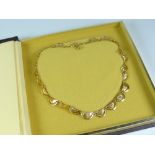 A 9ct yellow gold crescent link necklace, 13.2grms