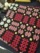 A good black ground & multi-coloured geometric Welsh woollen blanket