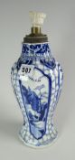 A nineteenth century Chinese blue & white vase of lobed form with four panels of decoration