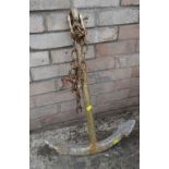 A vintage cast iron ship's anchor (outside)