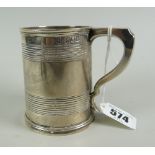 A silver antique mug with rib decorated, hallmarked for London 1897 by George Jackson & David