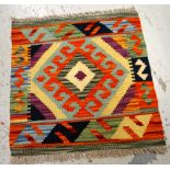 A vegetable dye wool Choli Kilim mat, 50 x 50cms