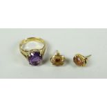 A modern amethyst ring & pair of similar earrings