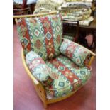 Light Ercol armchair with modern patterned upholstery