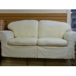 Modern cream coloured settee