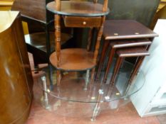 Parcel of oval three tier glass coffee table, polished whatnot and a nest of three tables