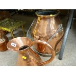 Copper milk churn with brass rim and a beaten copper water jug