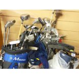 Large parcel of golf clubs and bags, trollies etc