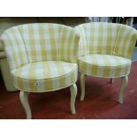 Two check upholstered tub chairs