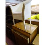 Five drawer chest with carved detail to top and an item of white loom style furniture