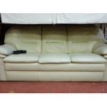 Modern cream three seater faux leather sofa